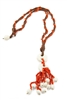 Beautiful drop Pendant is held by two White Coral Beads with strands of Sciacca Coral Beads as the Tassel with White Coral Beads at the ends. The cord band has additional strands of Sciacca Coral wrapped along the length. Button closure. Made in Italy