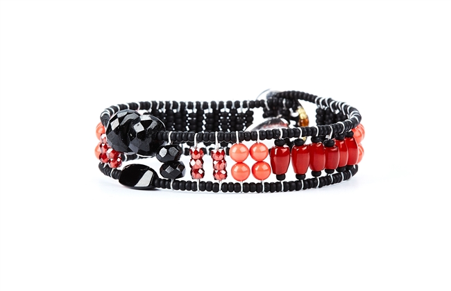 From Ziio's Twilight Collection. This narrow tennis Bracelet is a beautiful blend of Red, Pink & Orange outlined in Black. Coral, Carnelian, Agate, Black Onyx, Brass & Murano Glass Beads. 925 Sterling Silver Button Closure, adjustable in length.