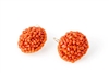 Rajola's Maya Earrings are large button drops in Sciacca Coral. Tiny Coral Nuggets are woven onto a sphere to create this dramatic effect. Crafted in Italy, 18k Gold