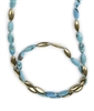 A perfect Necklace for the Turquoise lover in you. Long Turquoise Gemstone Necklace alternates with brushed Gold plated Sterling Beads in the same shape & size as the Gemstones. Wear long or doubled. Made in Italy by Anticoa. Length 42", width 10mm.