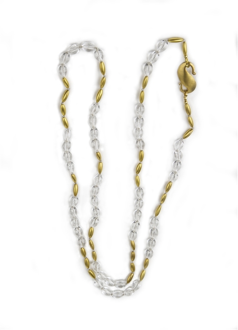 This is a Necklace you will reach for again and again - clear Crystal Beads are alternating with smaller brushed Yellow Gold plated Beads. Wear it long or doubled. Easy to layer with other Gold Necklaces. Made in Italy by Anticoa. Length 42", hook latch