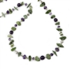 The irregular Gemstone shapes and mix of color give this Necklace it's unique appeal. Green Serpentine stone Beads complimented by the Purple Amethyst Gemstones. 925 Sterling Silver chain & slide clasp. Length 36". Stones vary from 3/8" to 1" in width