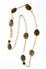 Long 18k Yellow Gold Chain Necklace with 272ctw of Smokey Quartz & Citrine Gemstones. Bonjour, written in Gold with a small Diamond drop & two Bronze Pearls add Italian style. The chain is substantial with floating links. Lobster clasp. L 32" X W 3/4"