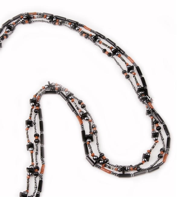 Long 3 strand Black Onyx Necklace filled with movement & visual interest. Each strand features different shapes & sizes of Onyx, Red Coral & Hematite Gemstones, sure to catch your eye. Made in Italy by Rajola. Fits over the head, no latch. Length 38"