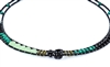 Ziio's thin Giro Necklace in various hues of Green Gemstones - Malachite, Chrysoprase, Green Zircon & Black Tourmaline. A great beaded piece to add a subtle touch of color. Hand crafted in Italy on Stainless Steel wire with Murano Glass Seed Beads.