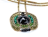 From Ziio's Twilight Collection. This striking Pendant Necklace has a Black Onyx Gemstone at the center, surround by multi-shades of Green & Black Gemstones. Jade, Malachite, Tourmaline, Brass & Murano Glass Beads. Hand crafted in Italy.