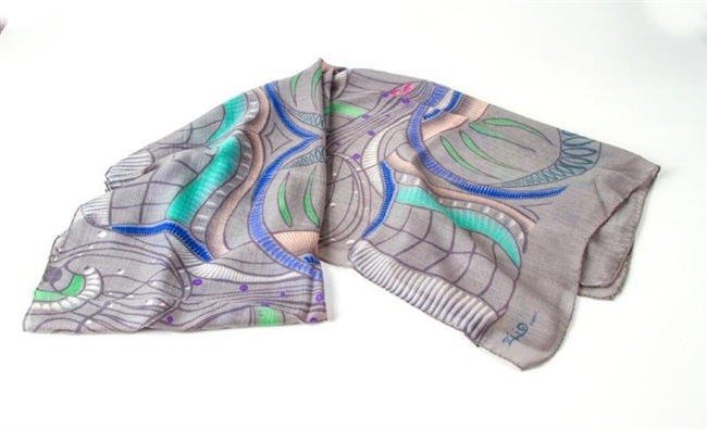 Ziio's Jungle Print Cashmere Shawl in Grey. A beautiful pattern in Grey, Blue, Pink, Green and Cream. Made in Italy with a hand rolled finished edge. L 82" X W 27"