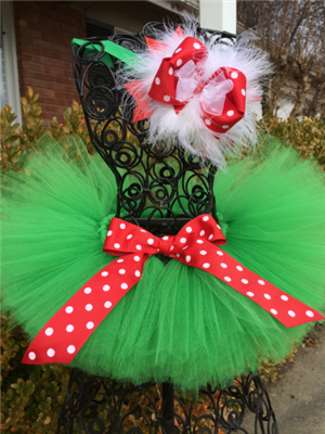 green tutu with red and white polka dot bow