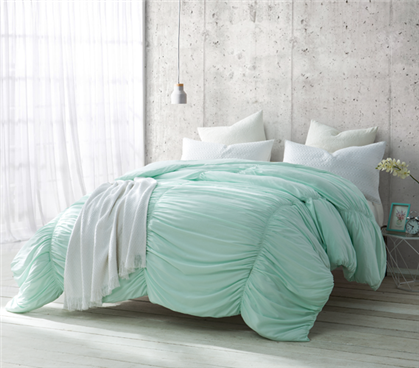College Twin XL comforter with rippled wave details in soft mint color