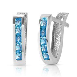 ALARRI 1.2 CTW 14K Solid White Gold Oval Huggie Earrings Blue Topaz