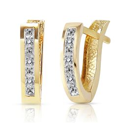 ALARRI 0.04 Carat 14K Solid Gold Oval Huggie Earrings Diamond