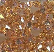 Swarovski 4mm 5301/5328 Bicone - Topaz AB Color