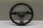 Personal Polyurethane Grinta Steering Wheel 350mm Black Polyurethane / Black Spokes / Yellow Logo