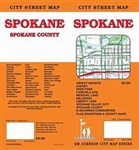 Detailed city map showing highways, street names, recreation trails, informative icons such as schools and parks etc.  A Spokane County map and Spokane and Vicinity map  is included.  Also several insets of districts within the county are shown.