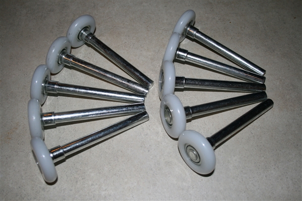 Quiet garage door roller wheels