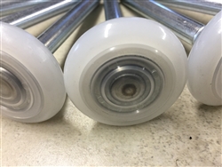 Quiet garage door roller wheels