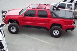 N-Fab's Wheel-to-Wheel Nerf Steps for '02-'06 Chevy/GMC Avalanche With Cladding Short Bed