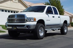 N-Fab's Wheel-to-Wheel Nerf Steps for '97-'01 Dodge Ram Quad Cab 4 Door Long Cab