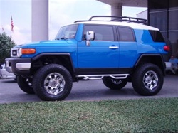 N-Fab's Stainless Steel Wheel-to-Wheel Nerf Steps for '04-'09 Toyota FJ Cruiser 2" Main Tube