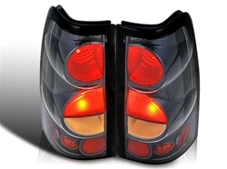 99-06 Chevy Silverado Altezza Tail Light, Carbon/Clear, by Winjet