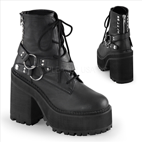 Stylish are these Demonia women's vegan boots. Shown here with the 4 3/4 inch block heel, 2 1/4 inch cleated platform, and lace up front black ankle boot. 