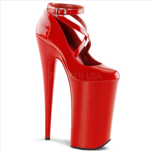 These are wild red patent leather shoes by Pleaser that have a 10 inch heel, 6 1/4 inch platform, and a swirling crisscross ankle strap, closed toe, and closed back.