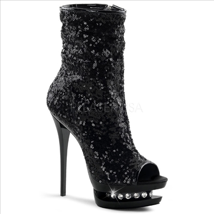 These New York fashion boots are styled with black sequins and feature rhinestone accents in the mid-platform of these full inner side zipper midcalf boots.