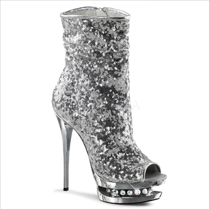 These New York fashion boots are styled with silver sequins and feature rhinestone accents in the mid-platform of these full inner side zipper midcalf boots.