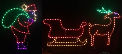 Santa loading Sleigh with Reindeer