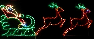 Santa in Sleigh with 2 Leaping Deer Medium
