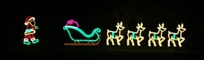 Santa Walking to Sleigh with Reindeer