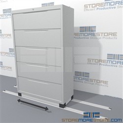 One sliding lateral filing cabinet on floor rails will expand your existing filing storage capacity without taking up extra floorspace