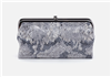 Women's vintage leather clutch wallet in enchanted floral and magnetic closure