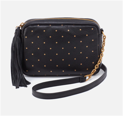 Women's black leather crossbody bag with small gold stars on the front and back with leather and chain strap.