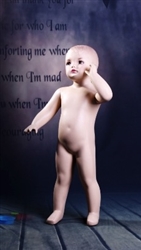 Standing toddler mannequin. Unisex toddler with realistic facial features.