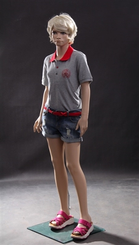 Female teenage mannequin with realistic facial features.