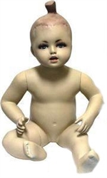 Toddler Mannequin in a Seated Pose from www.zingdisplay.com. Molded hair and realistic facial features.