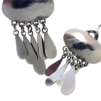 Puff Earrings photo. A puffed all silver round top with thins of silver dangling from it in shapes of drops.