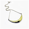 18k gold, fine and sterling silver hammered to shape.