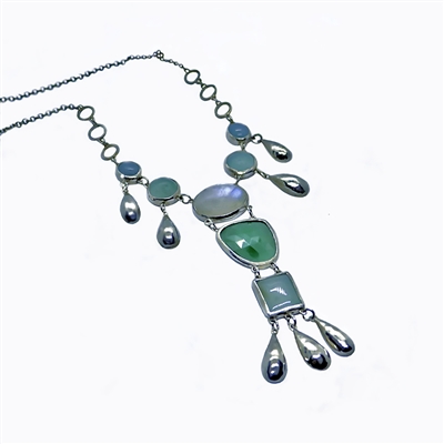 silver necklace with colored gems