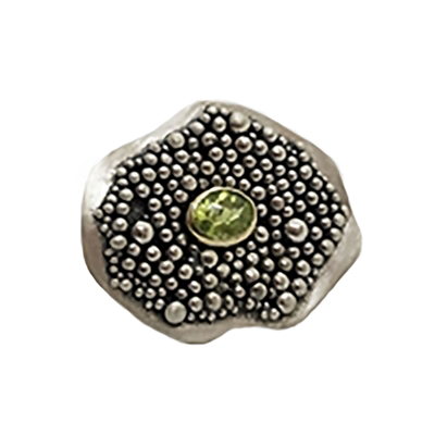 Handmade Ring made of sterling silver and 18k gold with peridot.