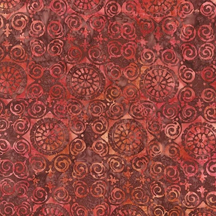 Palermo tile batik fabric in red, brown, and orange.