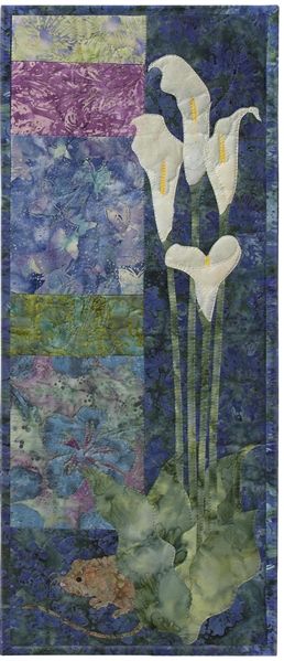 Quilt block showing a mouse hiding behind white lilies.