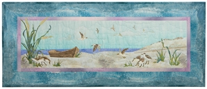 Quilt block of an empty boat on the beach, with sandpipers circling and looking for food.