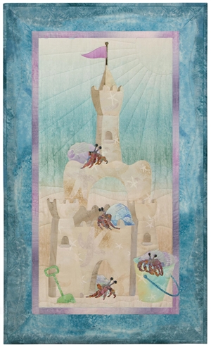 Quilt block of a grand sand castle, newly inhabited by hermit crabs.
