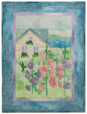 Quilt block of summer house that overlooks the bay, with cheerful pink and purple hollyhock flowers in the front yard.