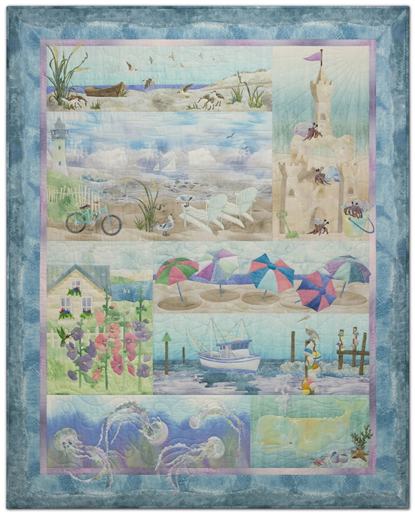 Quilt that shows playful beach and ocean scenes in soft, summer colors.