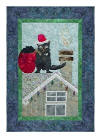 Quilt block of a Tasmanian Devil dressed as Santa on a roof with a sack of coal.