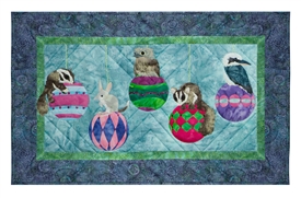Quilt block of Christmas baubles with Australian animals hanging off of them, including a bilby, a tawny frogmouth, a kookaburra, and two sugar gliders.