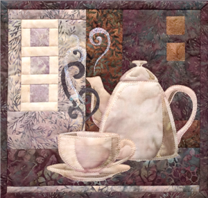 Quilt block of a beautiful coffee pot next to a steaming, fresh cup of coffee.